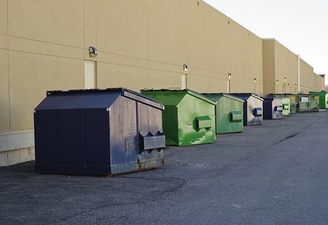 construction waste bins waiting to be picked up by a waste management company in Lakewood